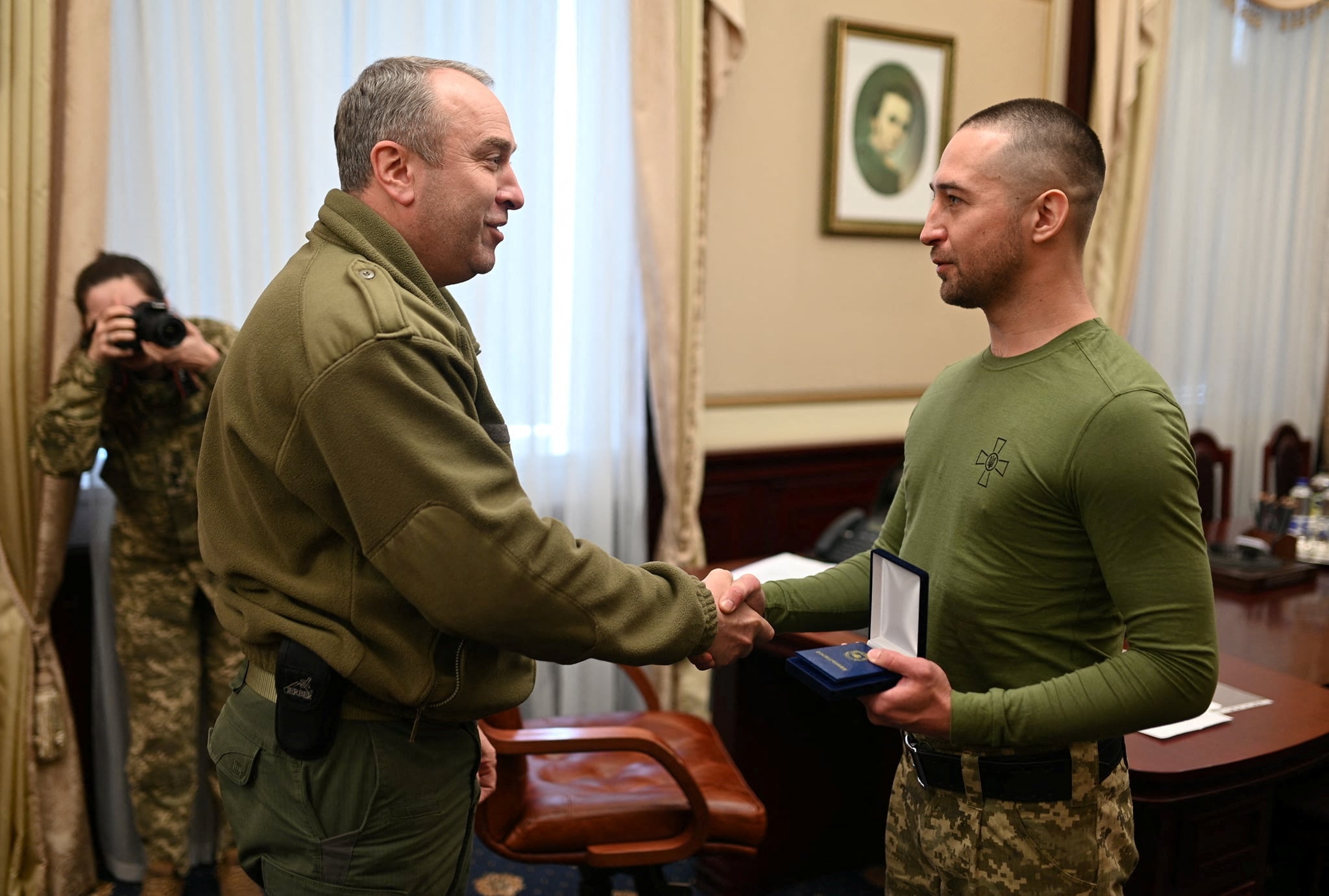 Ukrainian Roman Gribov, who was captured by Russian troops on Snake Island on February 24 and recently swapped for Russian POWs, receives an award