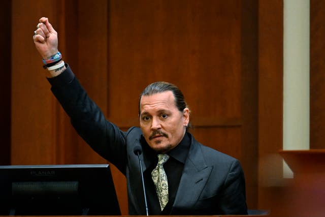 <p>Actor Johnny Depp testifies during a hearing at the Fairfax County Circuit Court in Fairfax, Va., Tuesday April 19, 2022</p>