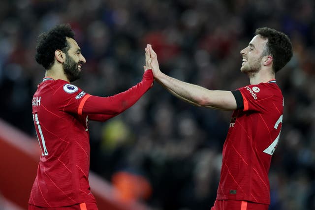 <p>Mo Salah scored twice as Liverpool impressively beat their old rival to move back to the top of the Premier League  </p>