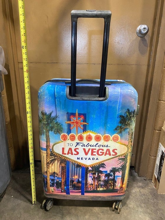 The suitcase that the child was found in has a distinctive Las Vegas design on its front and back