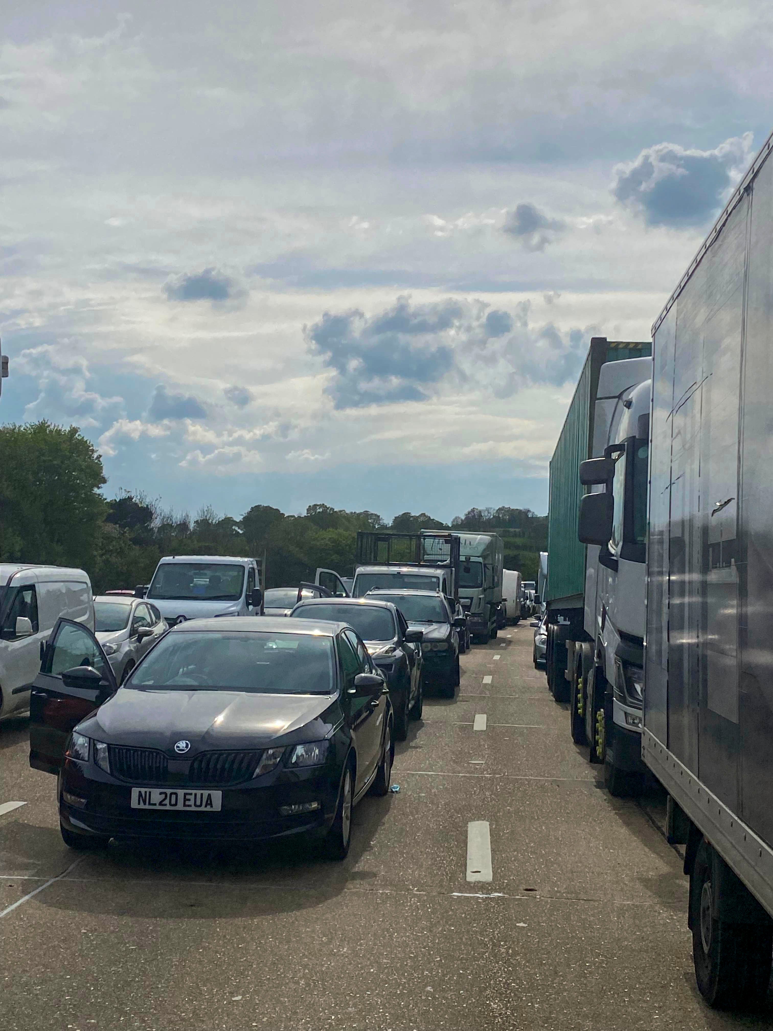 Vehicles stuck on the M25 motorway after an accident where cooking oil was spilt between junctions 24 and 25 on Wednesday