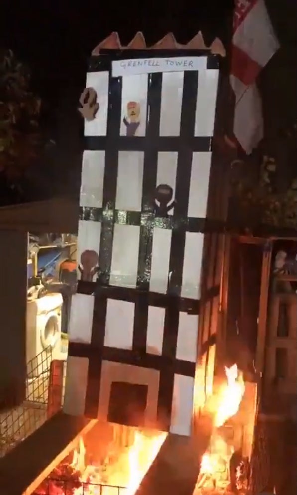 The video showed people laughing as they burned an effigy of Grenfell Tower