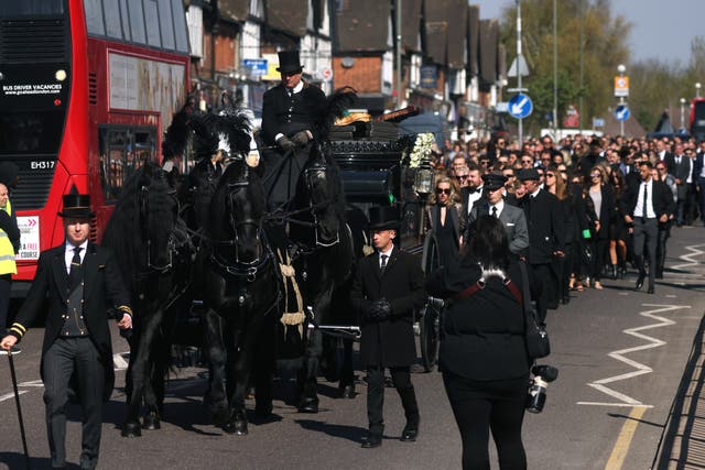 <p>The funeral procession for Tom Parker</p>