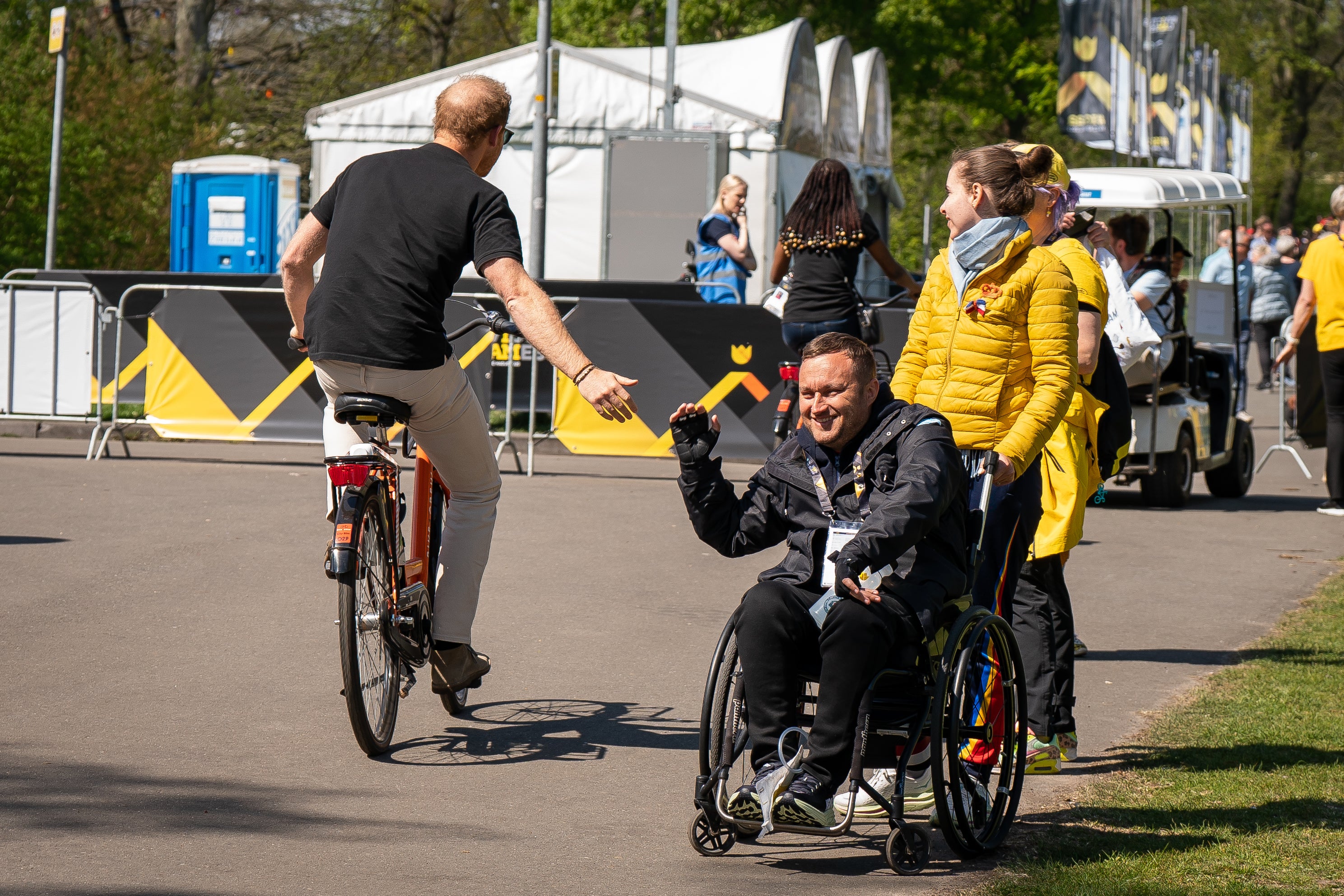 The Duke of Sussex cycles through Zuiderpark (Aaron Chown/PA)