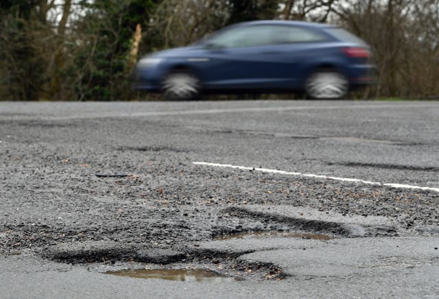 Fixing roads and pavements should be a top priority for councils, a new poll has found (Joe Giddens/PA)