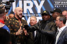 Tyson Fury and Dillian Whyte restrain team members in heated conclusion to cordial press conference