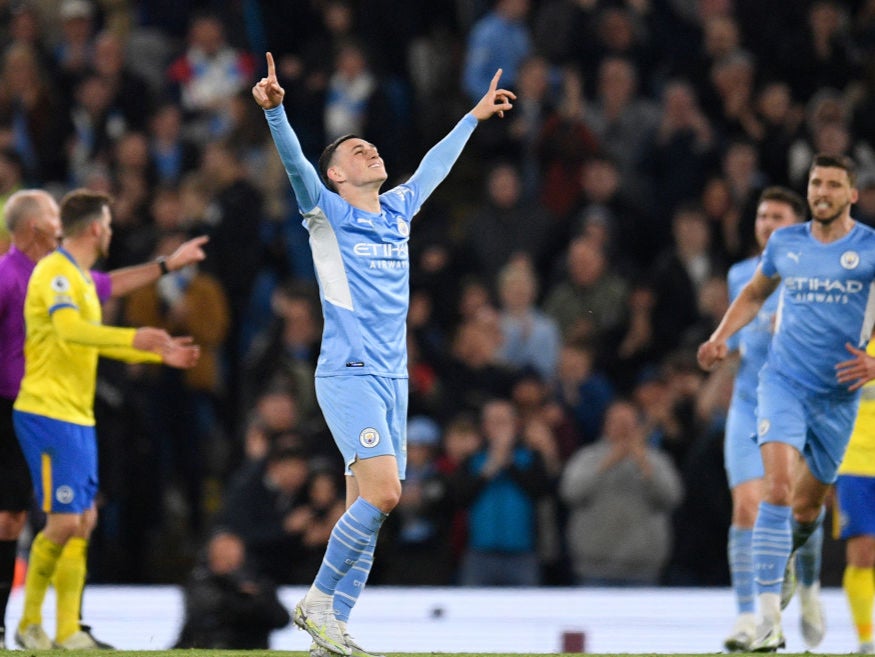 Phil Foden celebrates scoring Man City’s second