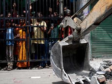 How a British bulldozer is being seen as a symbol of religious discrimination in India