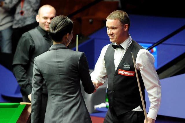 Stephen Hendry, right, is congratulated by match referee Zhu Ying after his 147 against Stuart Bingham in 2012 (Anna Gowthorpe/PA)