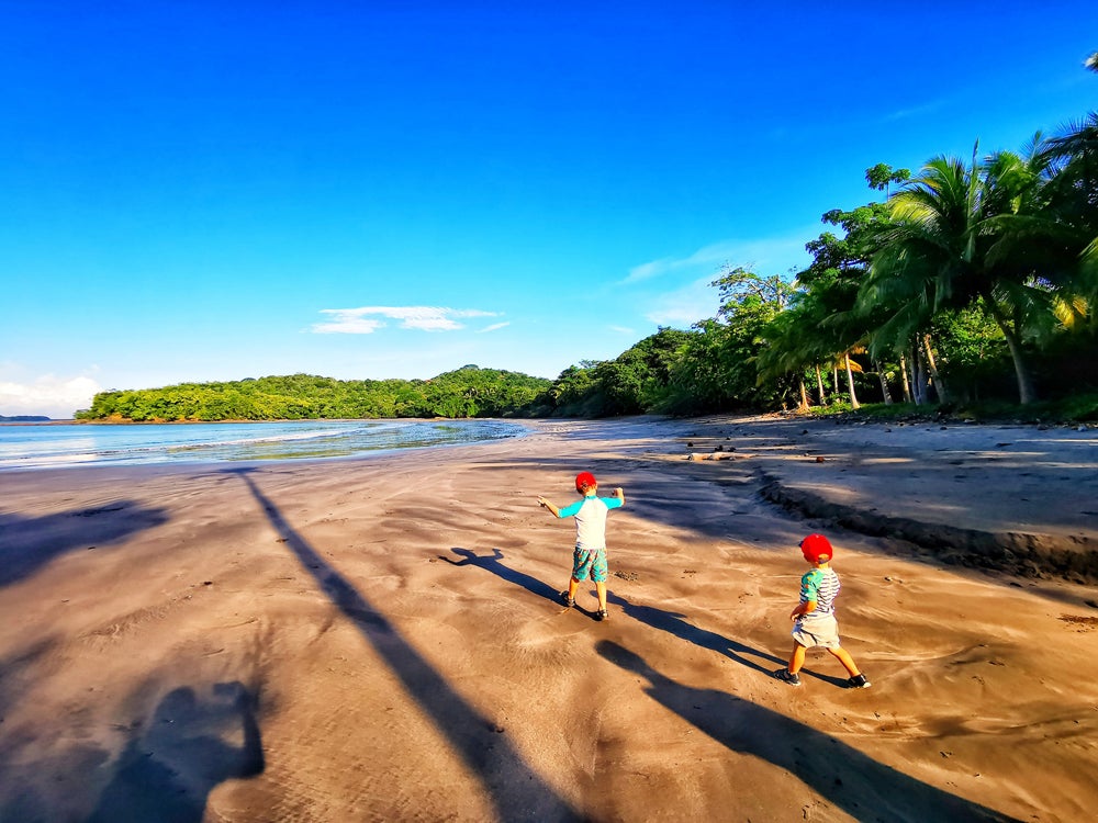 Ethan and Arlo enjoying a beach in Costa Rica (PA Real Life/Collect)