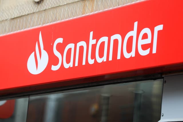 Santander is reducing its branch opening hours from July (PA)