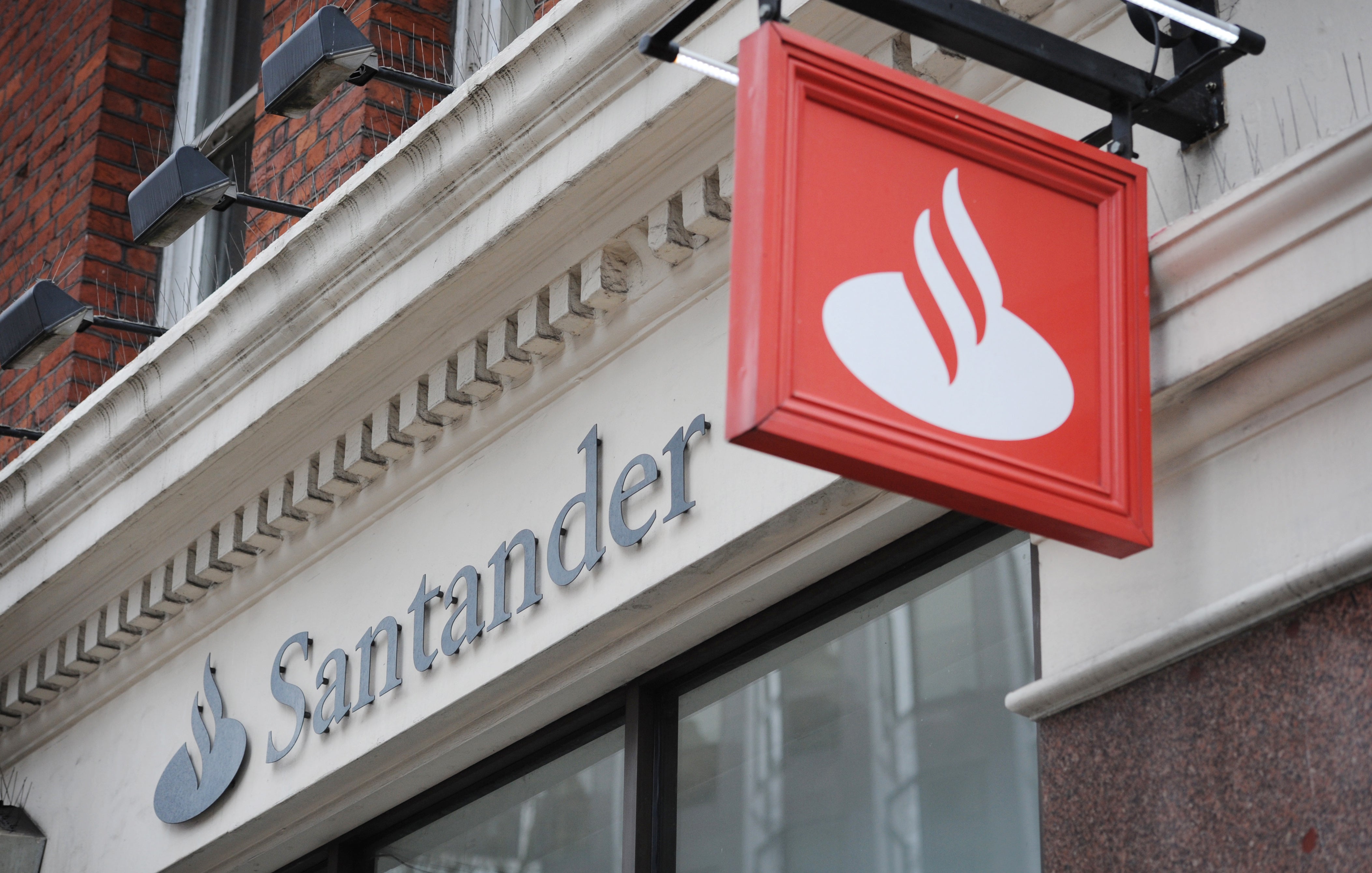 Most Santander bank branches will operate reduced hours from mid-July (PA)
