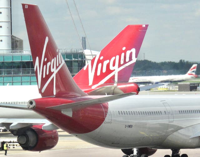 <p>Face off: Virgin Atlantic and British Airways aircraft at London Heathrow</p>