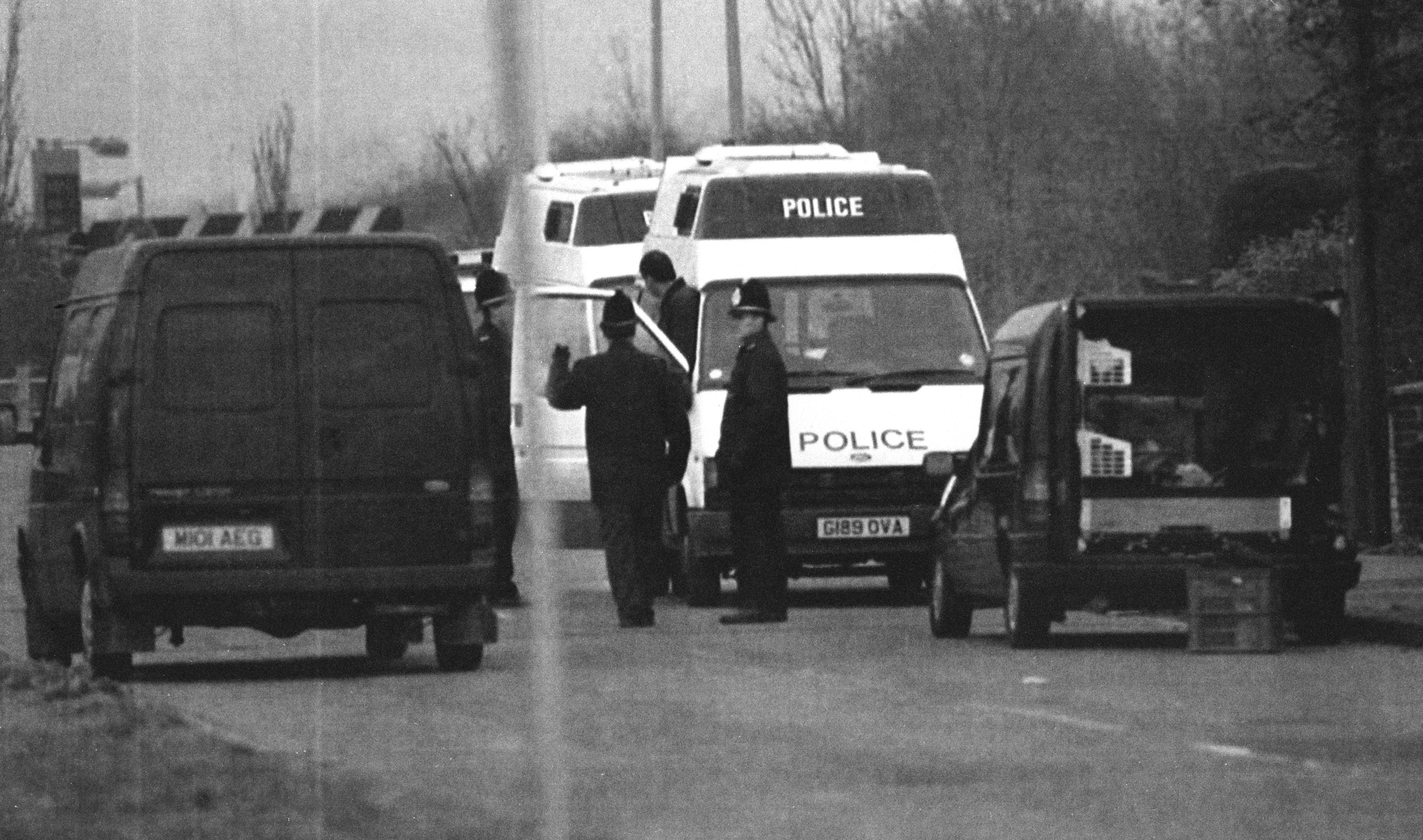 Police at the scene where the naked body of Rikki Neave was found on November 29 1994 (PA)