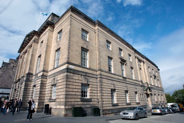 The trial is taking place at the HIgh Court in Edinburgh (PA)