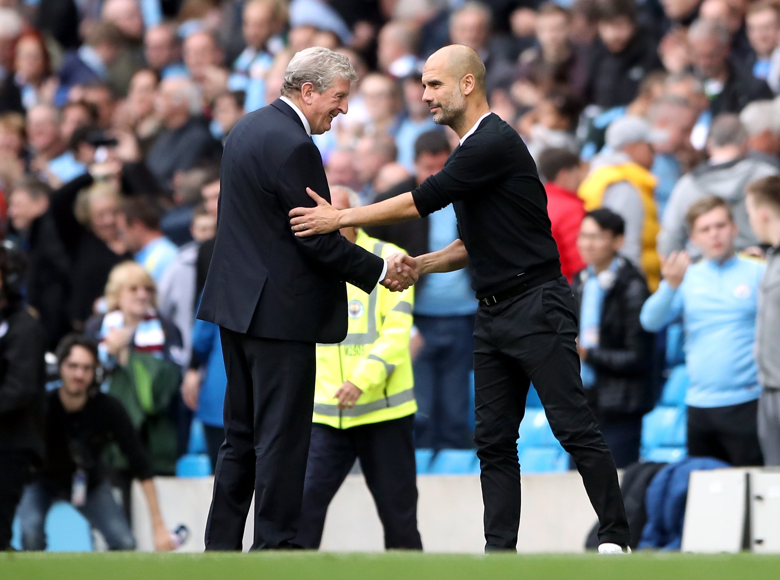 Roy Hodgson and Pep Guardiola have faced each other numerous times over recent years (Nick Potts/PA)