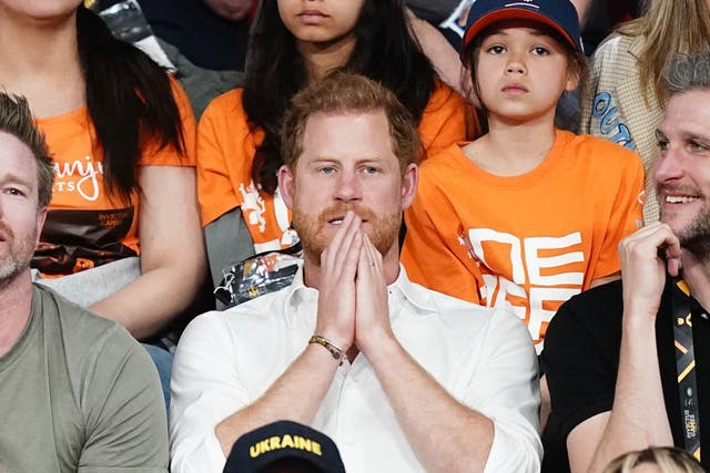The Duke of Sussex (centre) cheers on competitors during the Powerlifting event at the Invictus Games 2022 (Aaron Chown/PA)