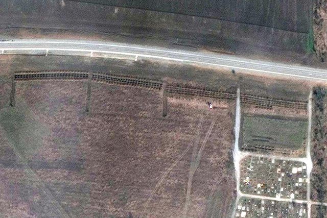 <p>A satellite image shows an overview of cemetery and expansion of the new graves in Manhush, near Mariupol</p>