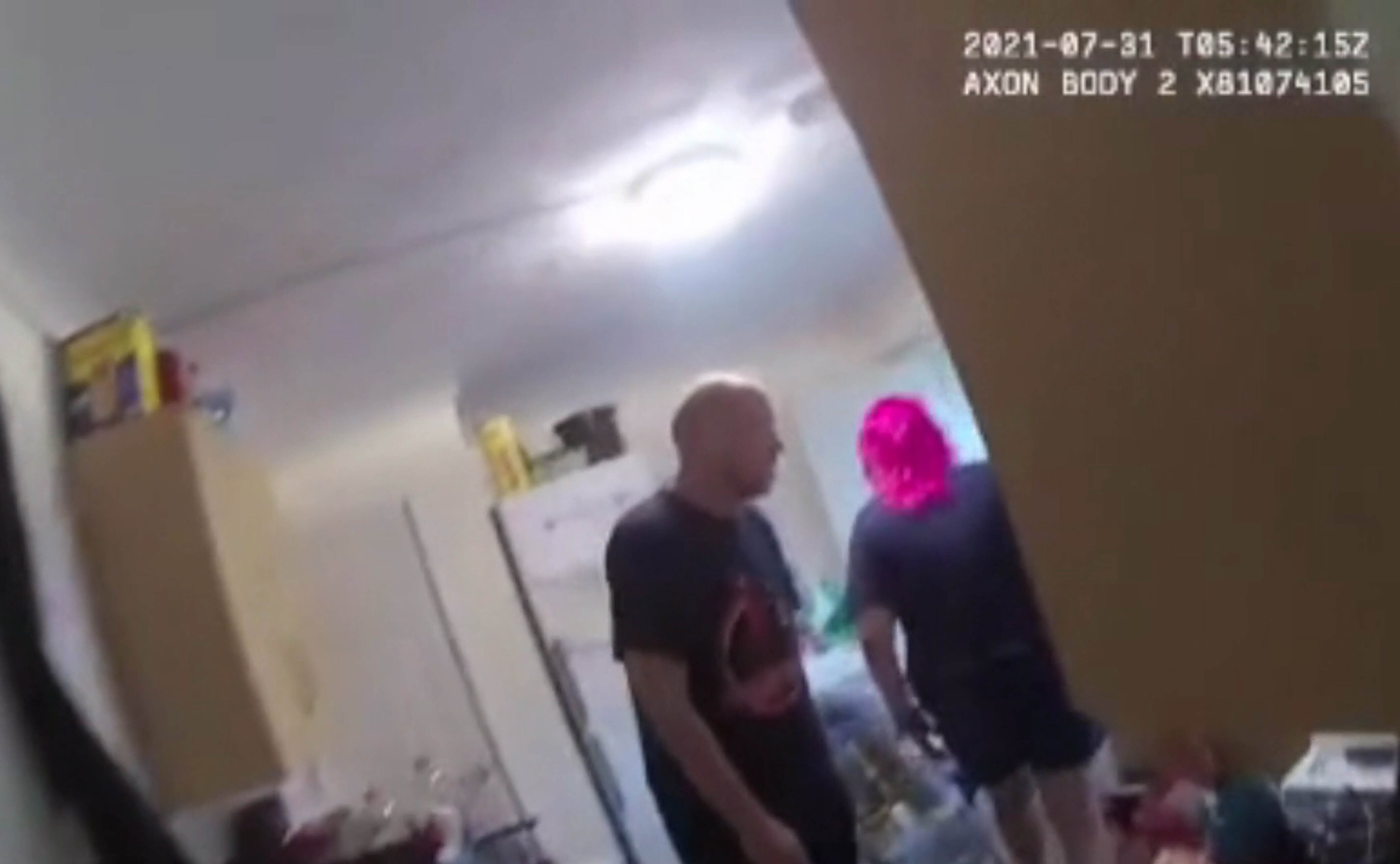 Police bodycam footage of Agharad Williamson and John Cole in the kitchen of their home after Logan was reported missing (South Wales Police/PA)