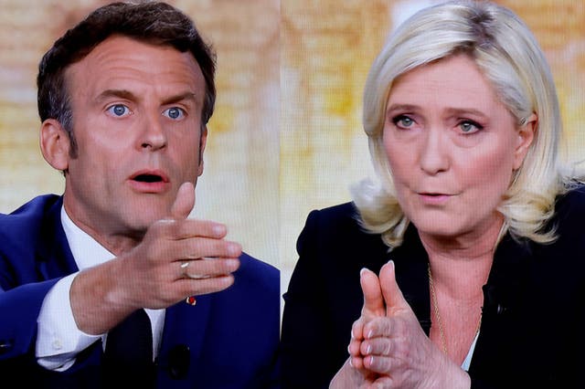 <p>Emmanuel Macron and Marine Le Pen debate each other on 24 April 2022 in Paris, France</p>