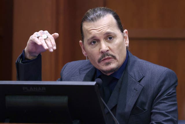<p>Actor Johnny Depp testifies in the courtroom at the Fairfax County Circuit Court in Fairfax, Va., Thursday, April 21, 2022</p>