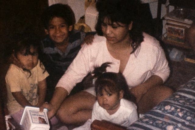 <p>Melissa Lucio with her children. Records show she never abused her children</p>