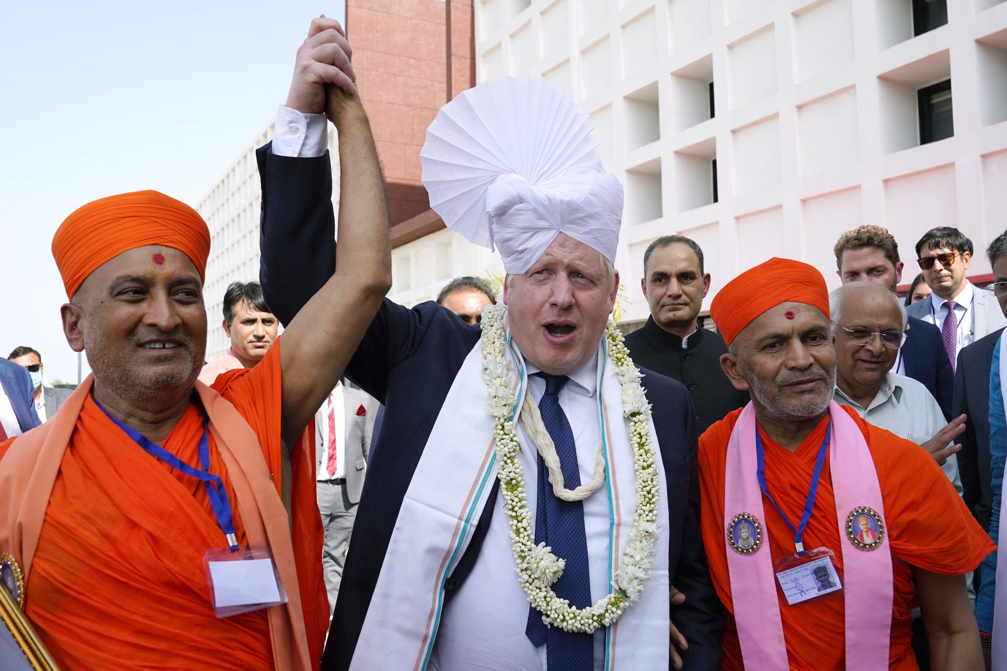Prime Minister Boris Johnson is dressed in a turban during a visit to Gujarat Biotechnology University, in Gandhinagar, Gujarat, as part of his two day trip to India on April 21, 2022 in Gandhinagar, India. During his two-day visit to India Boris Johnson is expecting to seal new collaborations on defence and green energy as he seeks to reduce the country’s dependence on Russian fossil fuels and military equipment