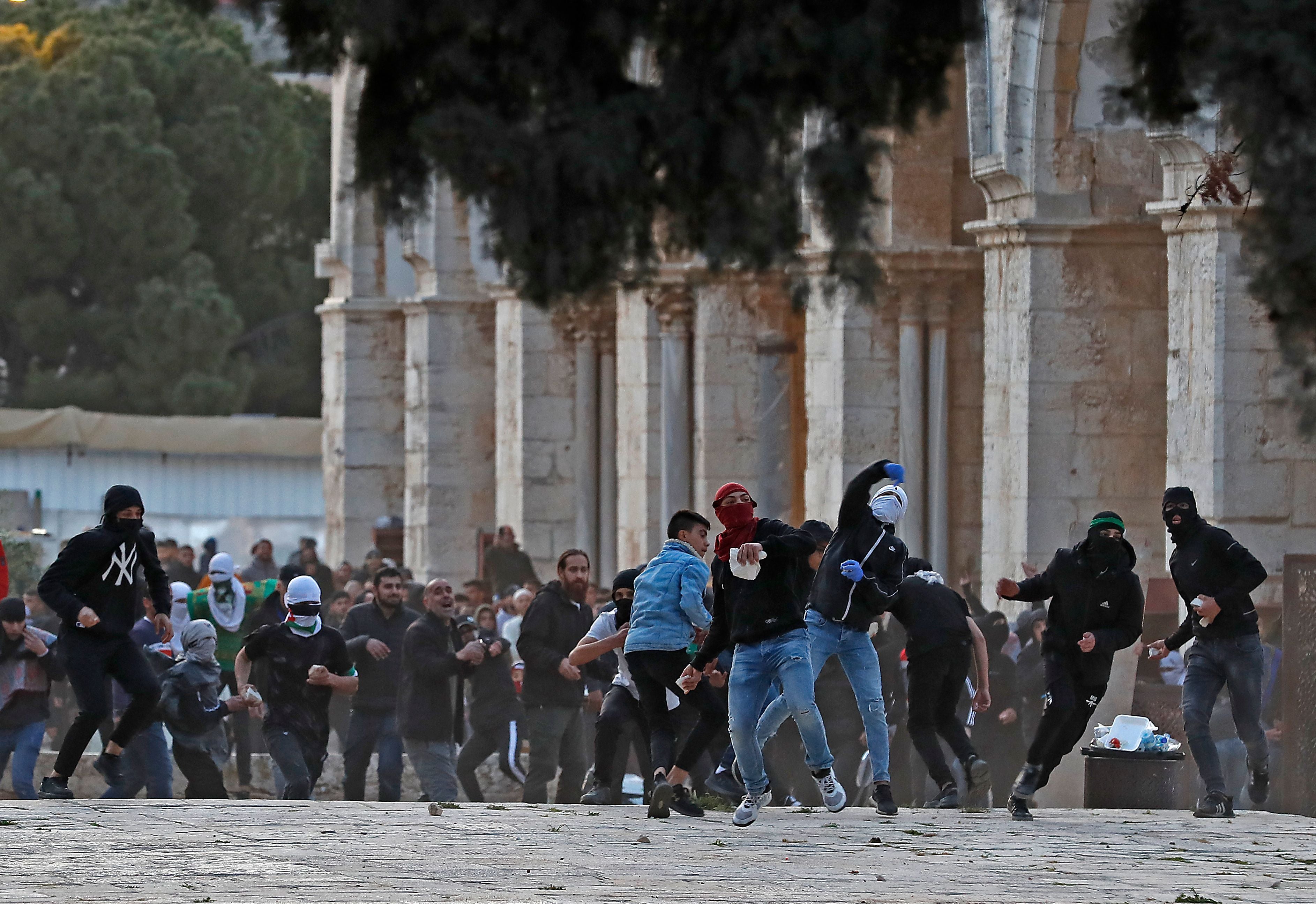 Palestinian demonstrators clash with Israeli police at Jerusalem's Al-Aqsa mosque compound