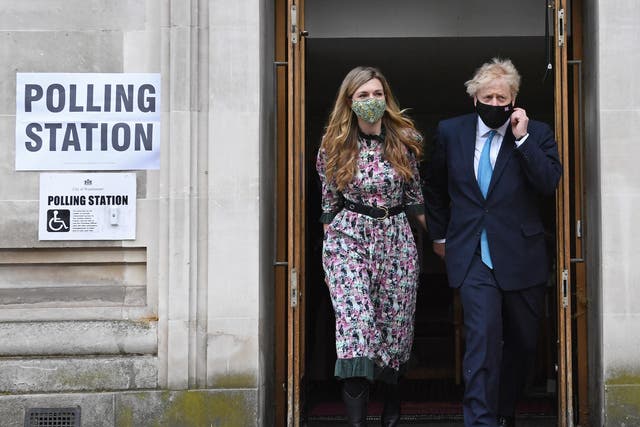 <p>Boris Johnson and wife Carrie at 2021 local elections</p>