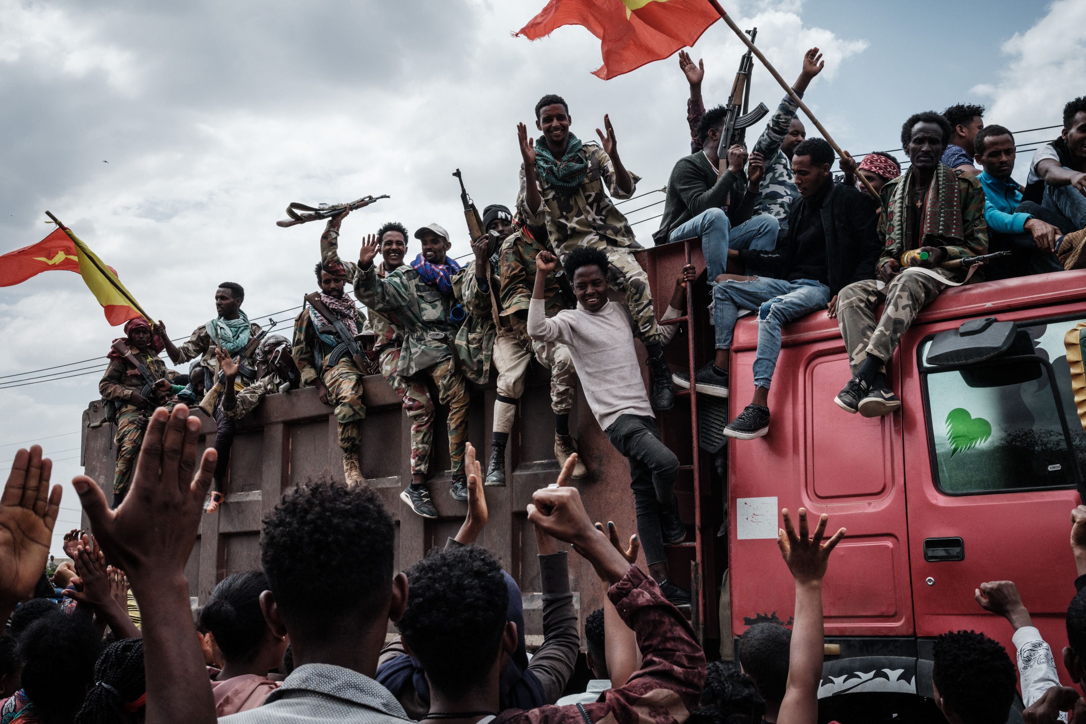 File photo: Tigray People’s Liberation Front (TPLF) fighters react to locals as they arrive in Mekele, the capital of Tigray region, in June 2021