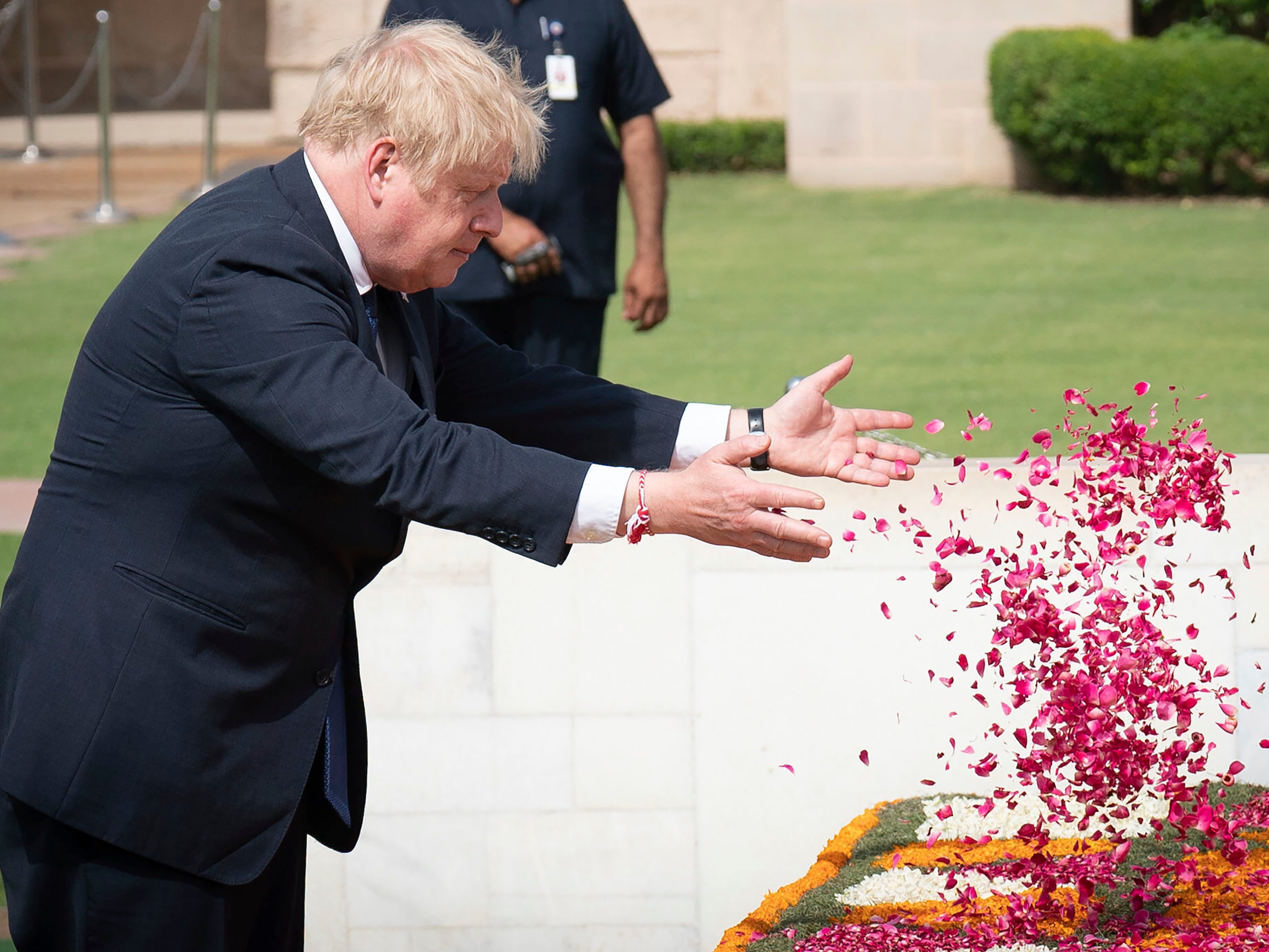 Boris Johnson scattered flower petals at Gandhi’s memorial
