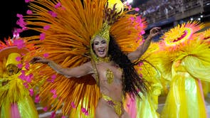 Rio carnival is BACK! Brazil's famous dancers look as flamboyant as ever as  parade returns