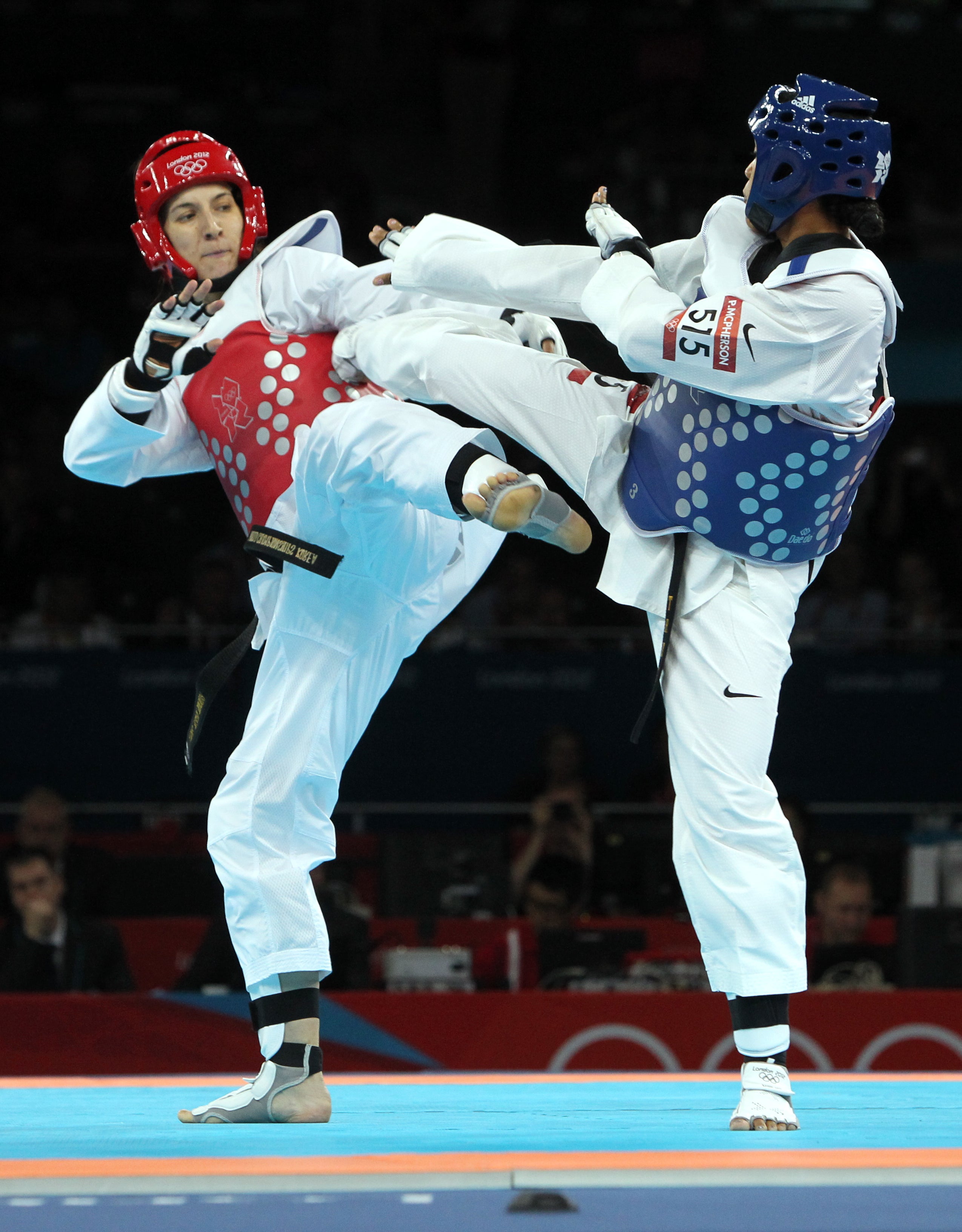 Two-time taekwondo world champion Sarah Stevenson (in red) announced her retirement on April 23 2013 (Steve Parsons/PA)