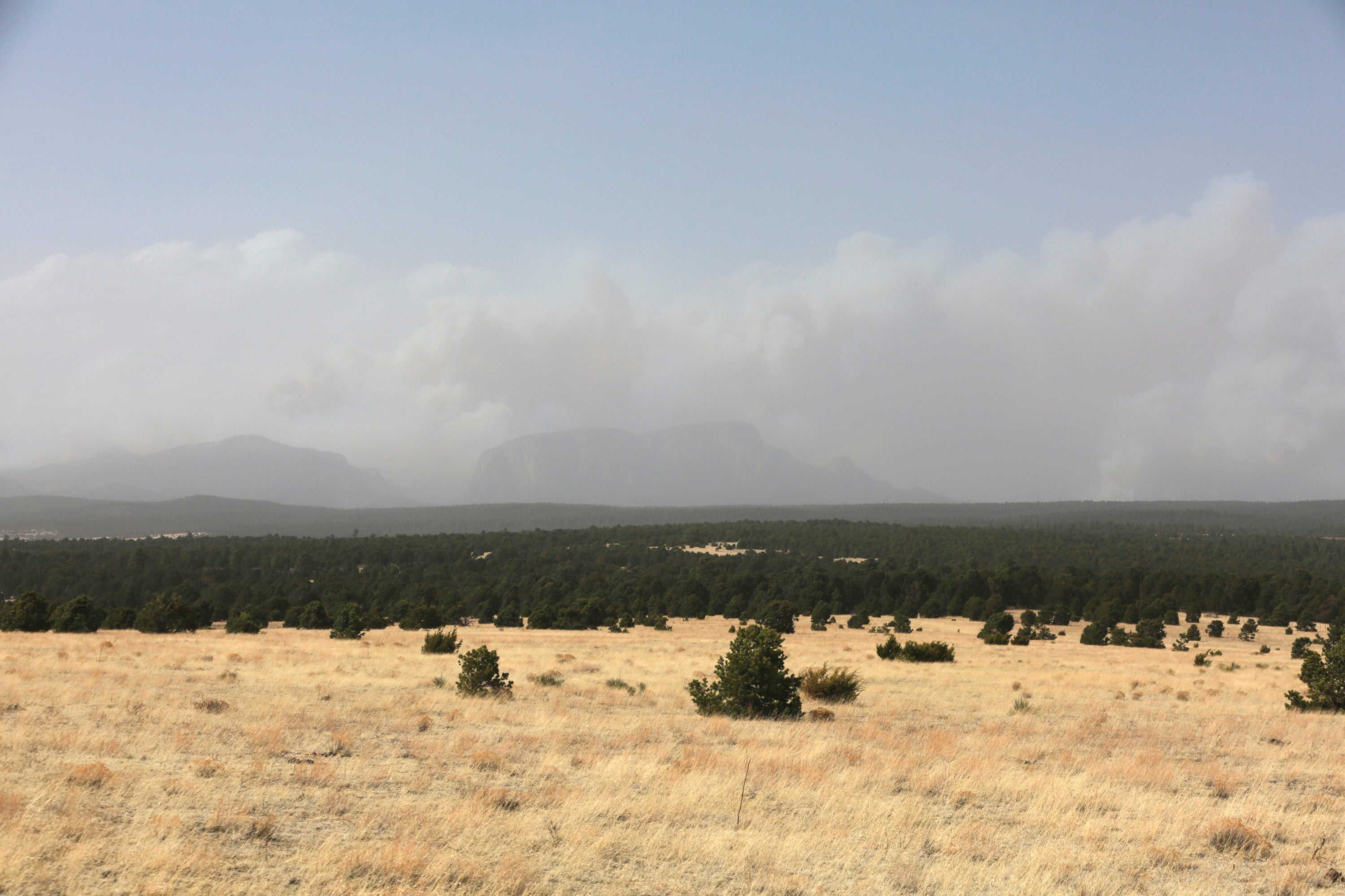 Wildfire smoke fills the air outside Las Vegas, New Mexico, near the Santa Fe National Forest, on Friday