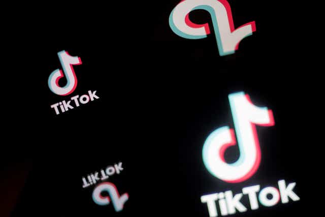 <p>A picture taken on 21 January 2021 in Nantes, western France shows a smartphone with the logo of Chinese social network Tik Tok</p>