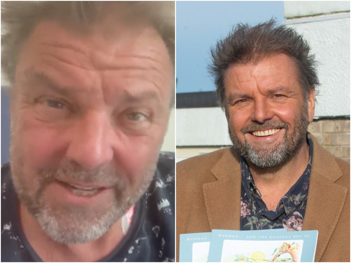 Martin Roberts watched as doctors removed 1.5 litres of fluid from his heart before emergency surgery