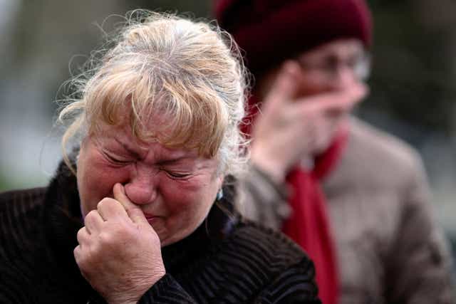 <p>Women react during the funeral of Ukrainian army officer Vyacheslav Vyacheslavovych Dimov, who was killed on 16 April in battle in the Vasylivka district of Zaporizhzhia region</p>