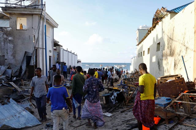<p>The aftermath of a suicide bombing which struck Somalia’s capital of Mogadishu in April </p>