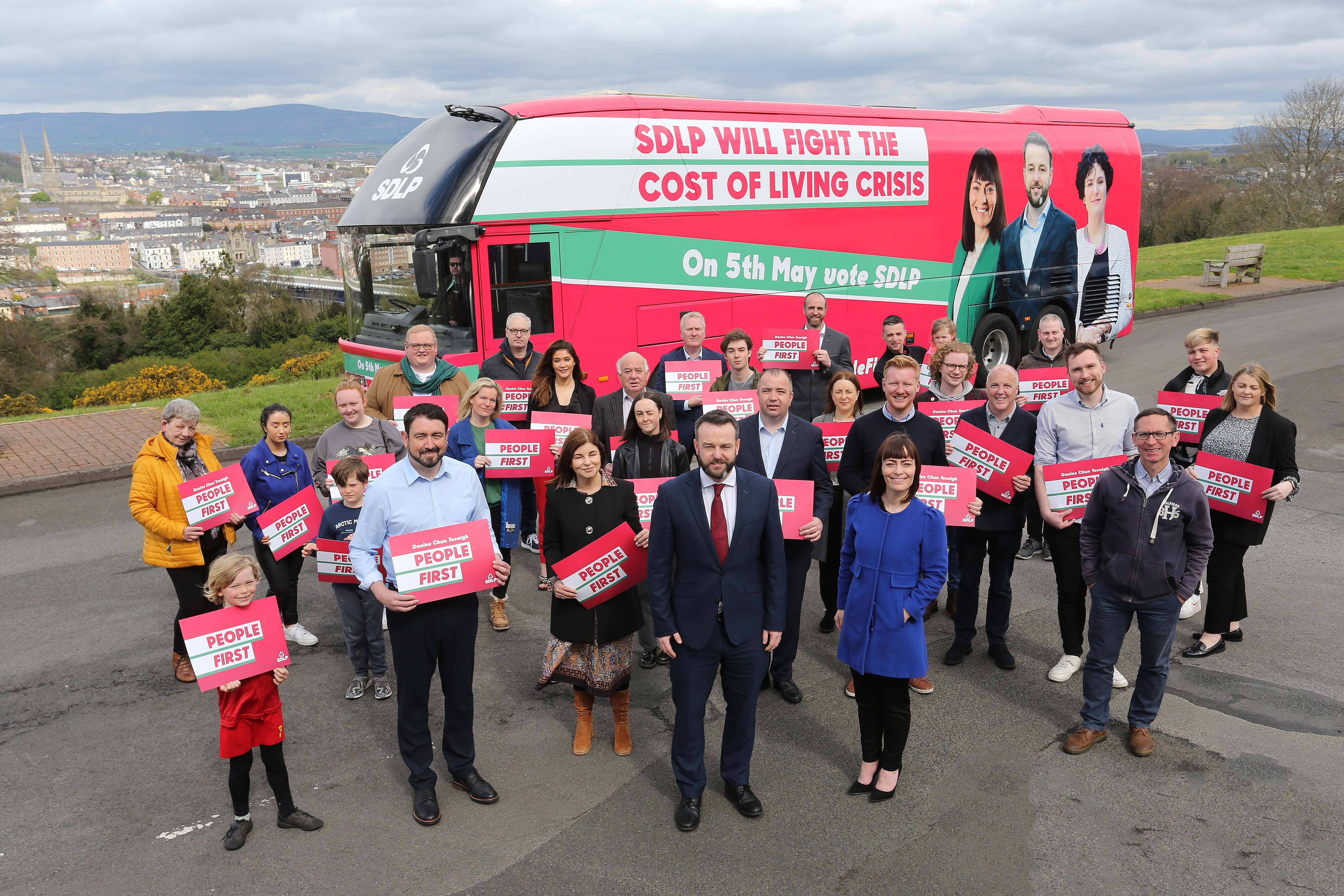 Colum Eastwood and Nichola Mallon (front centre) at the launch of the SDLP People First campaign bus (SDLP/PA)