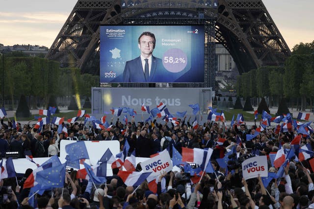 <p>Supporters react after the victory of the French president and La Republique en Marche (LREM) party candidate</p>