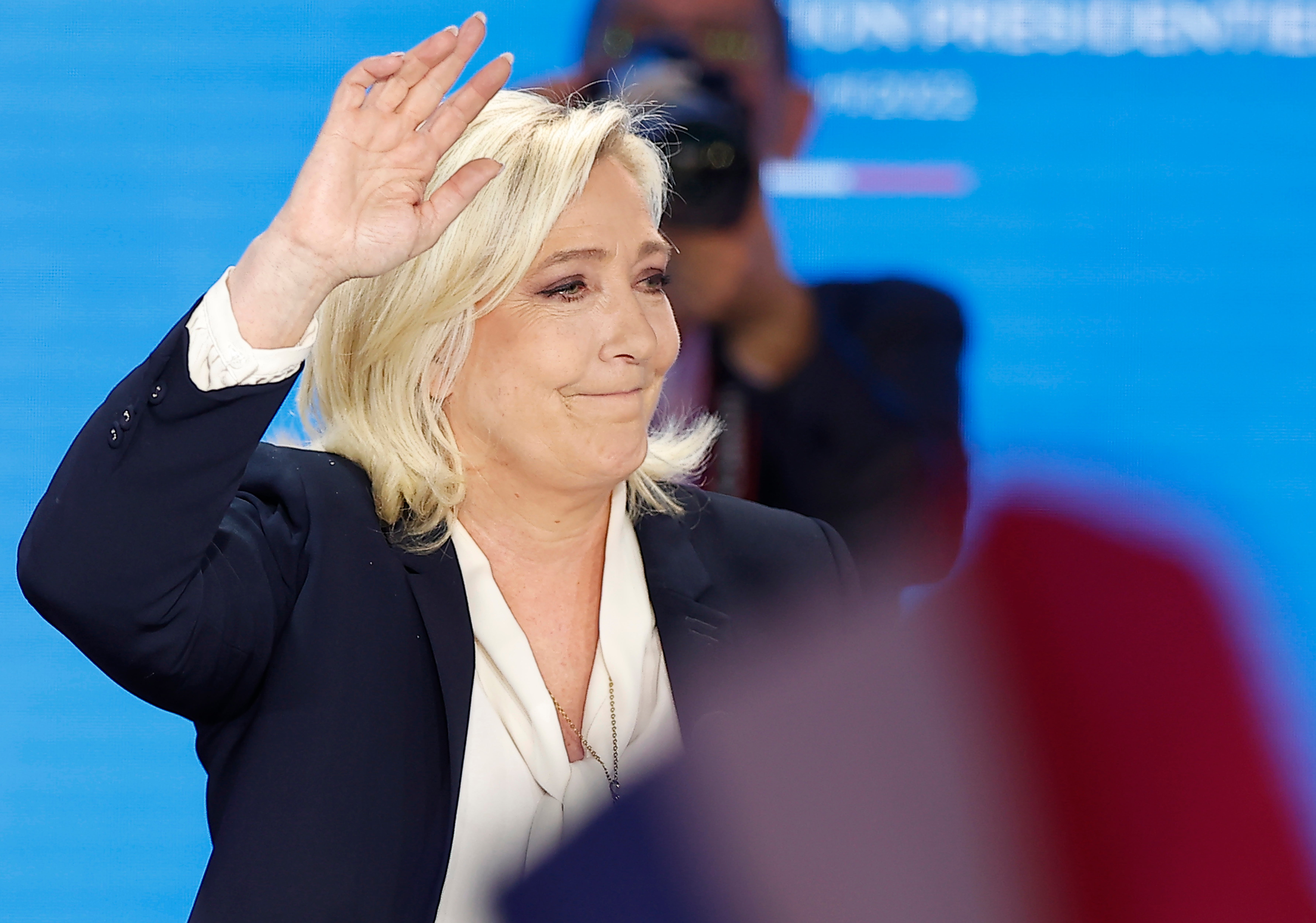 Marine Le Pen delivers a speech after being defeated in the second round