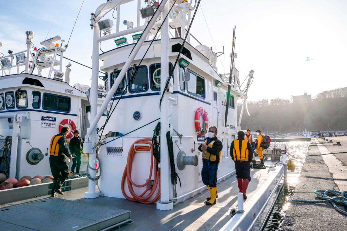 Child's body found after tour boat sank in Japan's far north