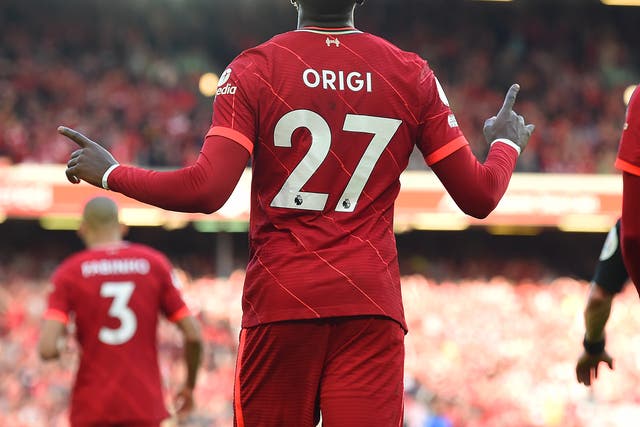 <p>Divock Origi celebrates scoring against Everton at Anfield </p>
