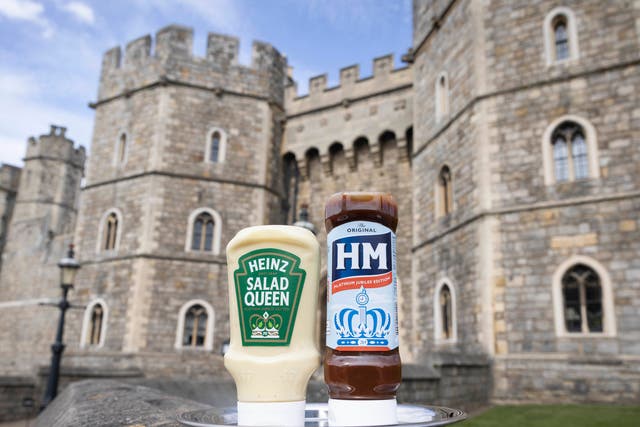 <p>Celebratory, limited edition Jubilee bottles of Heinz Salad Cream and HP Sauce, which have been renamed 'Heinz Salad Queen' and 'HM Sauce', respectively, are unveiled at Windsor Castle</p>