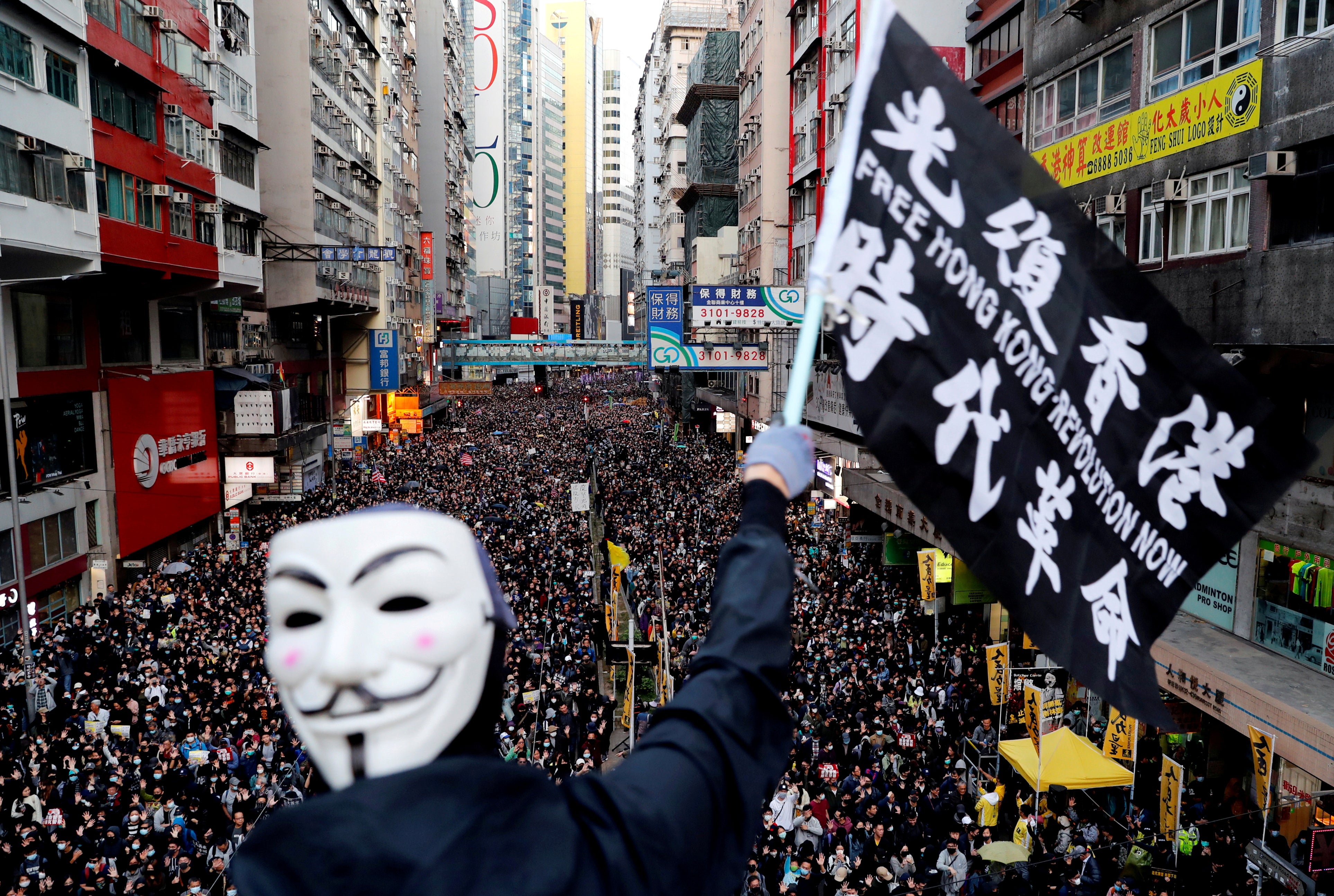 Pro-democracy protesters march for human rights in Hong Kong in 2019