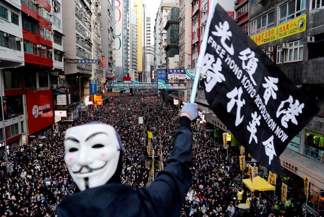 <p>File: Pro-democracy protesters march for human rights in Hong Kong in 2019</p>