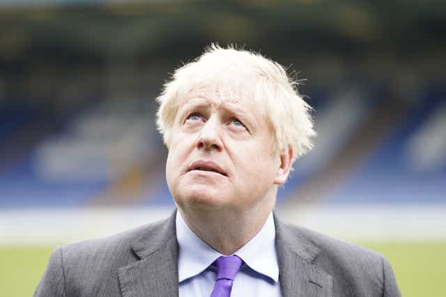 Prime Minister Boris Johnson during a visit to Bury FC at their ground in Gigg Lane, Bury, Greater Manchester (PA)
