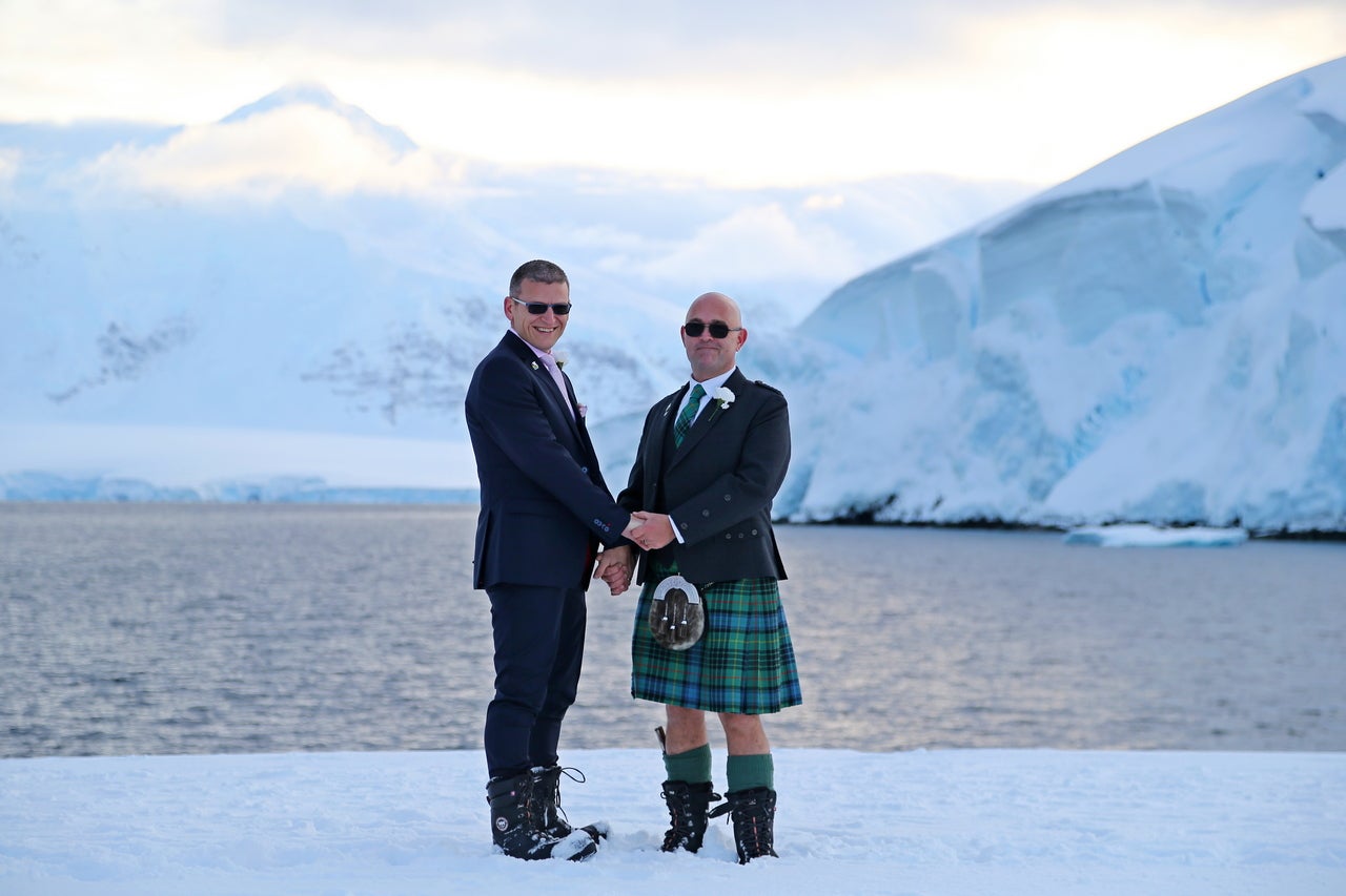 Eric Bourne and Stephen Carpenter, 41 and 49, celebrating in the British Antarctic Territory