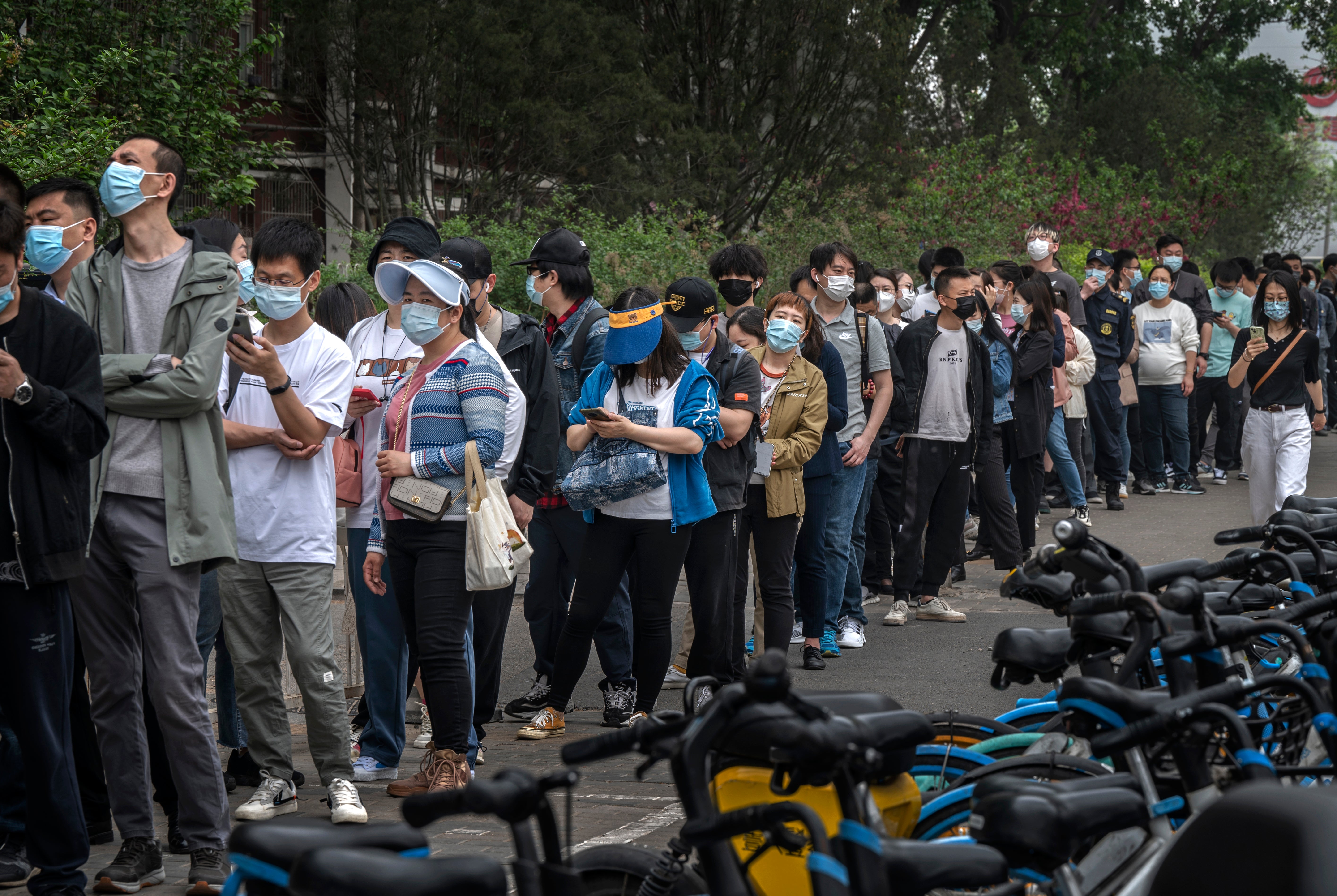 Residents in Beijing line up for Covid tests amid fears of a total lockdown