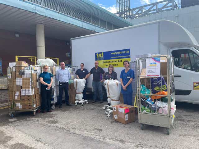 The neonatal team pictured with their donations (Liverpool Women’s NHS Foundation Trust/PA)